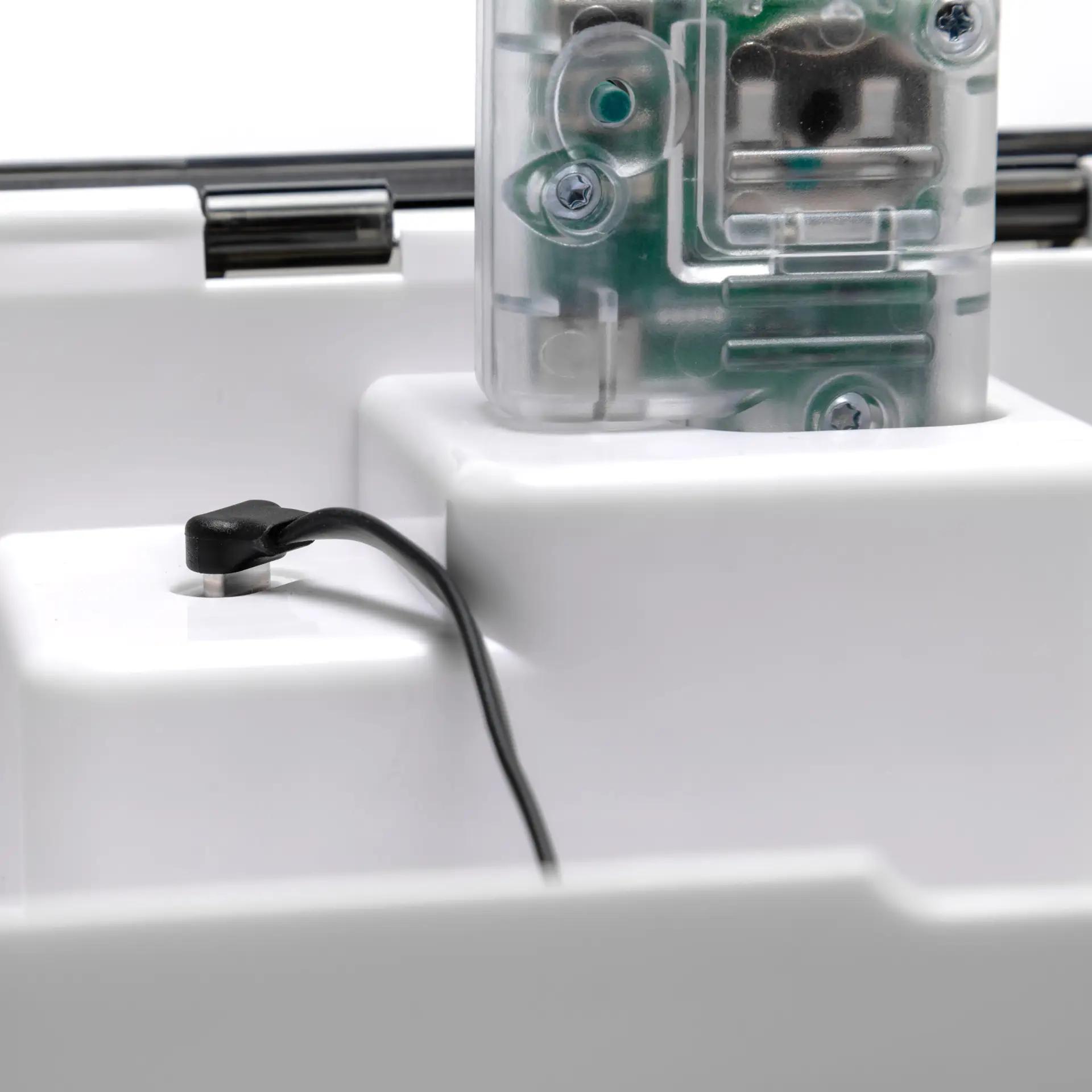 Redux Ultra Dry & Charge hearing aid dryer in use